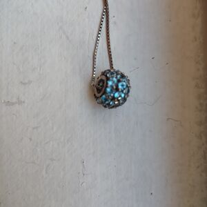 Dazzling Blue Topaz Beaded Glitter Ball.